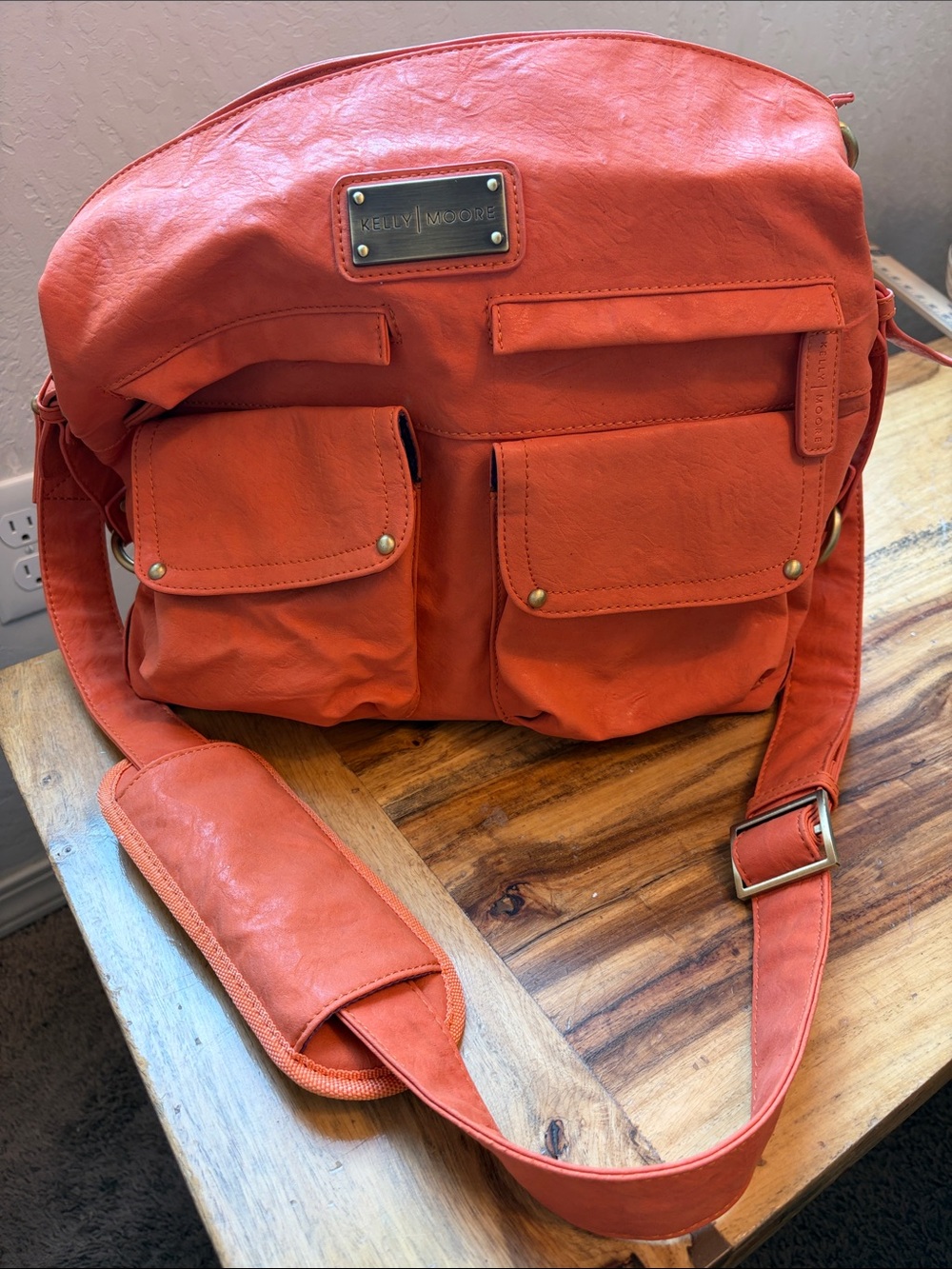 Kelly Moore Coral-Orange Camera or messenger Bag with Front Pockets